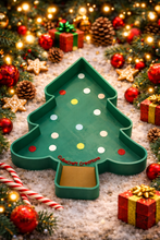 Christmas-themed cookie cutter with decorative elements on a festive background