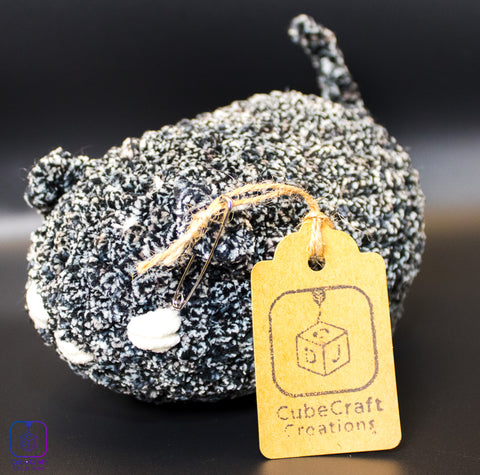 Textile product with a 'CubeCraft Creations' tag on a dark background