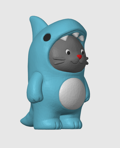 Toy figure of a cat in a shark costume on a light gray background