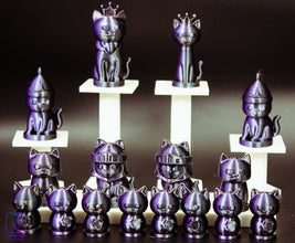Cat-themed chess pieces on stands against a dark background