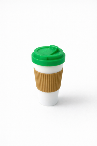 coffee shaped fidget clicker sensory toy white cup green lid brown sleeve on white background.