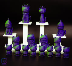 cat chess pieces on a black background
