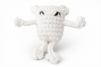 White plush toy with a skeleton design on a white background